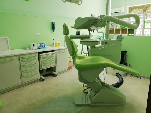 Studio Dentistico Com logo