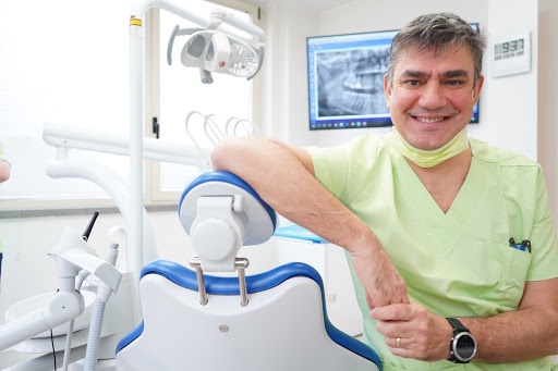 Studio Dentistico Tomezzoli Odontoiatria logo