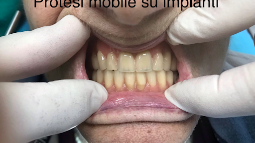 Studio Dentistico A.L. DENTAL SMILE logo